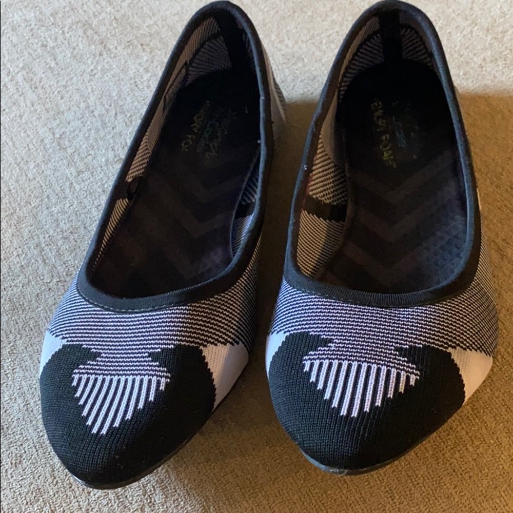 Black and white patterned flats